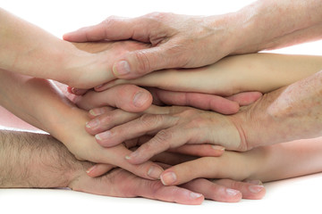 Fototapeta premium Zusammenhalt mit gestapelten Händen