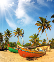 old fishing boats on beach in india - obrazy, fototapety, plakaty