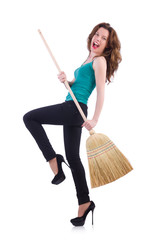Young woman with broom isolated on white