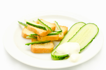 Diet appetizer of crispy toast and cucumber