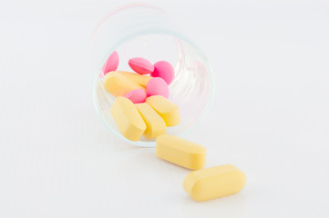 Medicine tablet in prescription glass