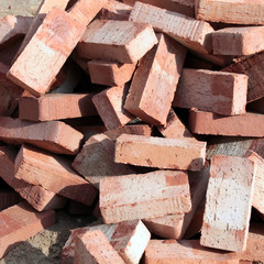 Heap of red ceramic bricks
