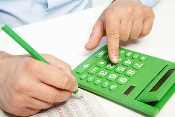 The businessman and green calculator
