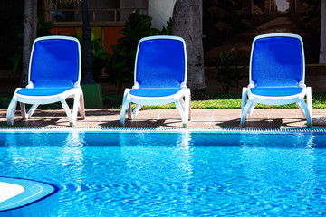 chairs by the pool