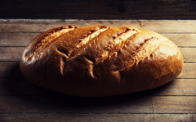 Delicious bread on a wood table
