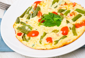omelette with green beans and cherry tomatoes