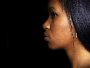 Portrait of a beautiful African girl in profile