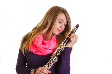 Girl with clarinet looking