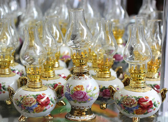 Fototapeta na wymiar kerosene lamps with painted roses