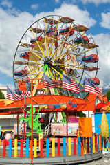Fototapeta premium Panoramic wheel at amusement park