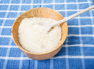 White Rice in Bowl with Wood Spoon
