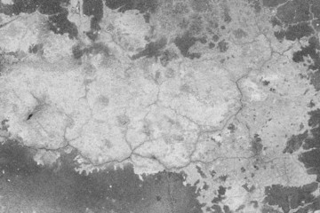 Grey wall background. Old concrete wall with cracks.