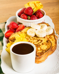 French toast with fruit and coffee