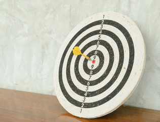 Dart in dartboard