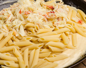 Dungeness Crab macaroni and cheese on the stove