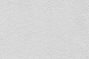 Obraz premium Close-up clean exterior painting white color rough surfaces concrete background texture, empty wall backdrop decoration house with space.Building new home interior construction architecture poster.