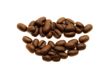 Smile. Coffee beans lying in the shape of lips