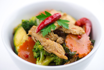 Closeup of spicy chicken Thai basil with seasonal vegetables
