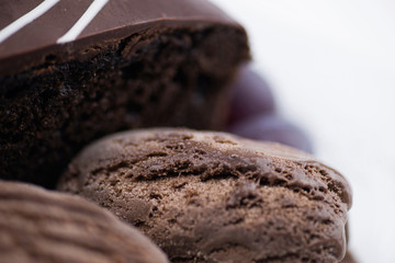 Closeup of chocolate cake and ice cream with grapes
