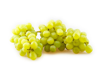 bunch of ripe grapes on a white background