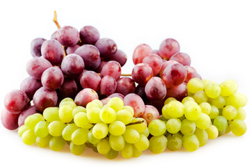 bunch of ripe grapes of different varieties