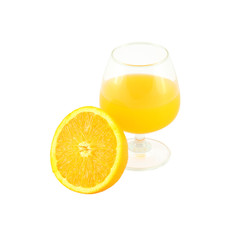 Orange juice in brandy glass and half fruit on white background.