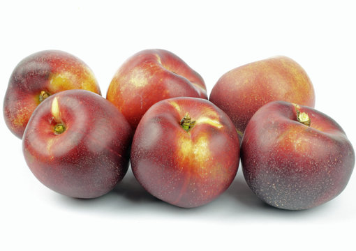 Nectarines On The White Background