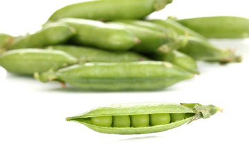 Green peas isolated on white
