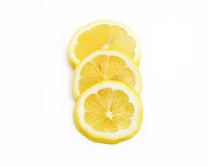 Foto op Plexiglas Slices of lemon fruit on white background © fakruljamil