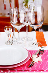 Table setting with glasses for different drinks