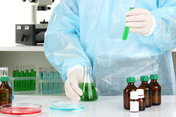 Scientist conducting research in laboratory close up