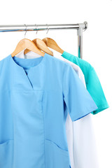 Medical clothing on hunger isolated on white