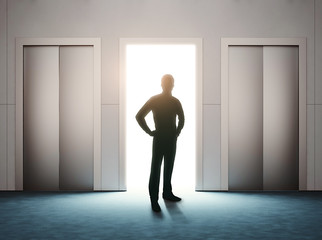 Fototapeta premium opened door with man silhouette