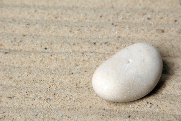 Fototapeta na wymiar Ogród zen z raked piasku i kamieni z bliska