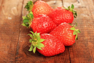 Fresh strawberry on wooden background