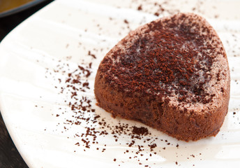 The chocolate mousse on the white plate