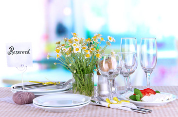Table setting with chamomiles