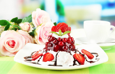 Tasty jelly dessert with fresh berries, on bright background