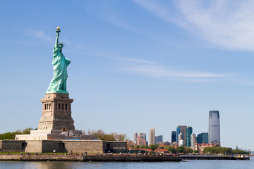 Statue of Liberty, and Manhattan Skyline behind it