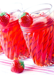 Strawberry juice with frozen icecubes