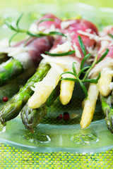 Fresh Young Asparagus Wrapped in Prosciutto Meat and Grilled - obrazy, fototapety, plakaty