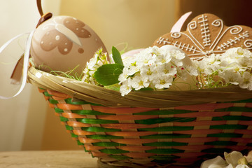 Fototapeta na wymiar Easter basket with white flowers