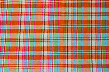 Orange, green, blue, red, black  striped cloth.