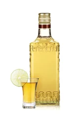 Zelfklevend Fotobehang Bottle of gold tequila and shot with lime slice © karandaev