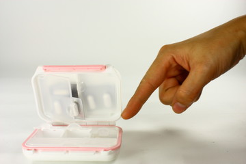 Point finger and pill box
