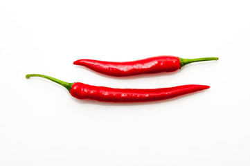 Two red chilli peppers