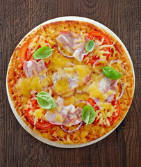 Pizza with bacon and tomato