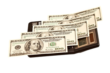 Business picture: money and calculator over white