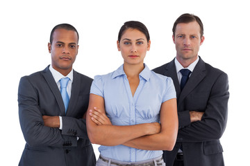 Group of serious business people standing together