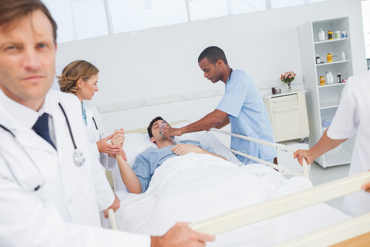 Doctors give oxygen to the patient
